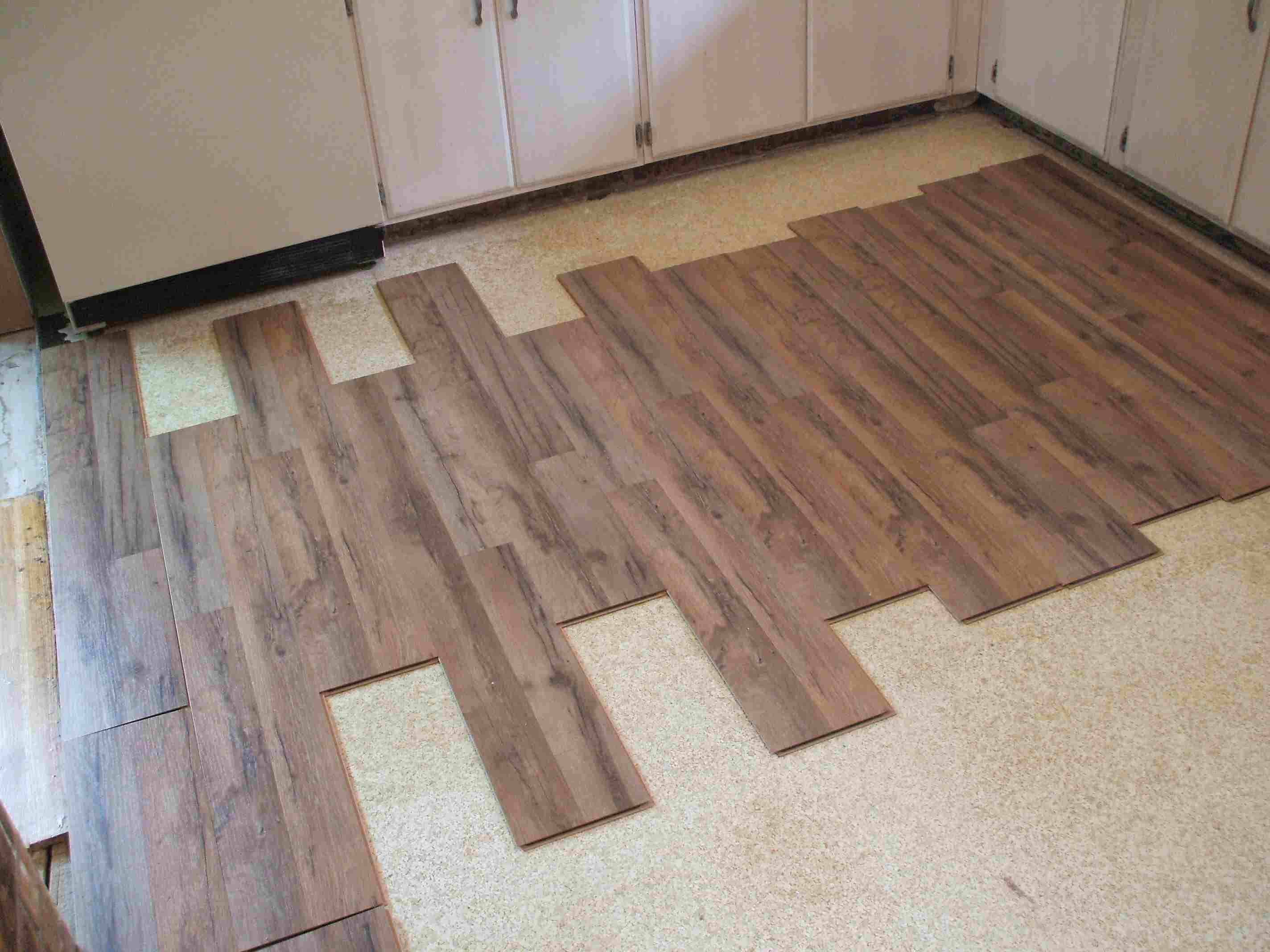 best way to install hardwood floors on concrete of laminate flooring installation made easy in installing laminate eyeballing layout 56a49d075f9b58b7d0d7d693 jpg