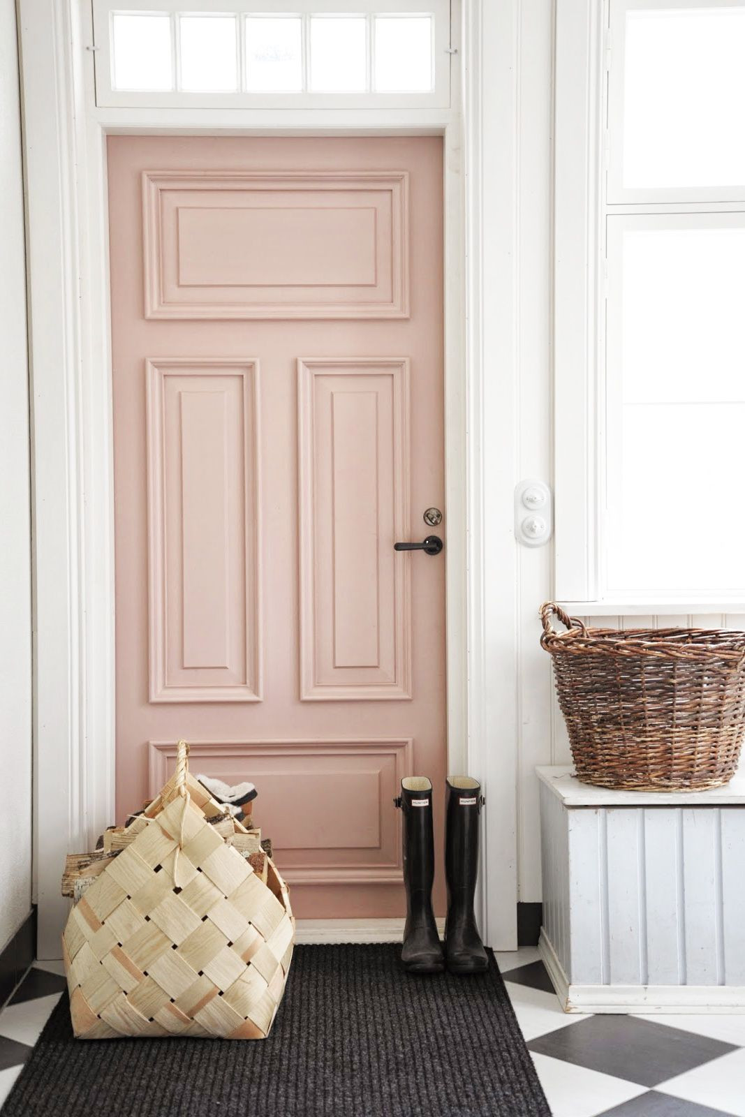 Different Color Hardwood Floors In Adjacent Rooms Of Rose Door Inside Home with Tiled Black and White Floors Knock In Rose Door Inside Home with Tiled Black and White Floors