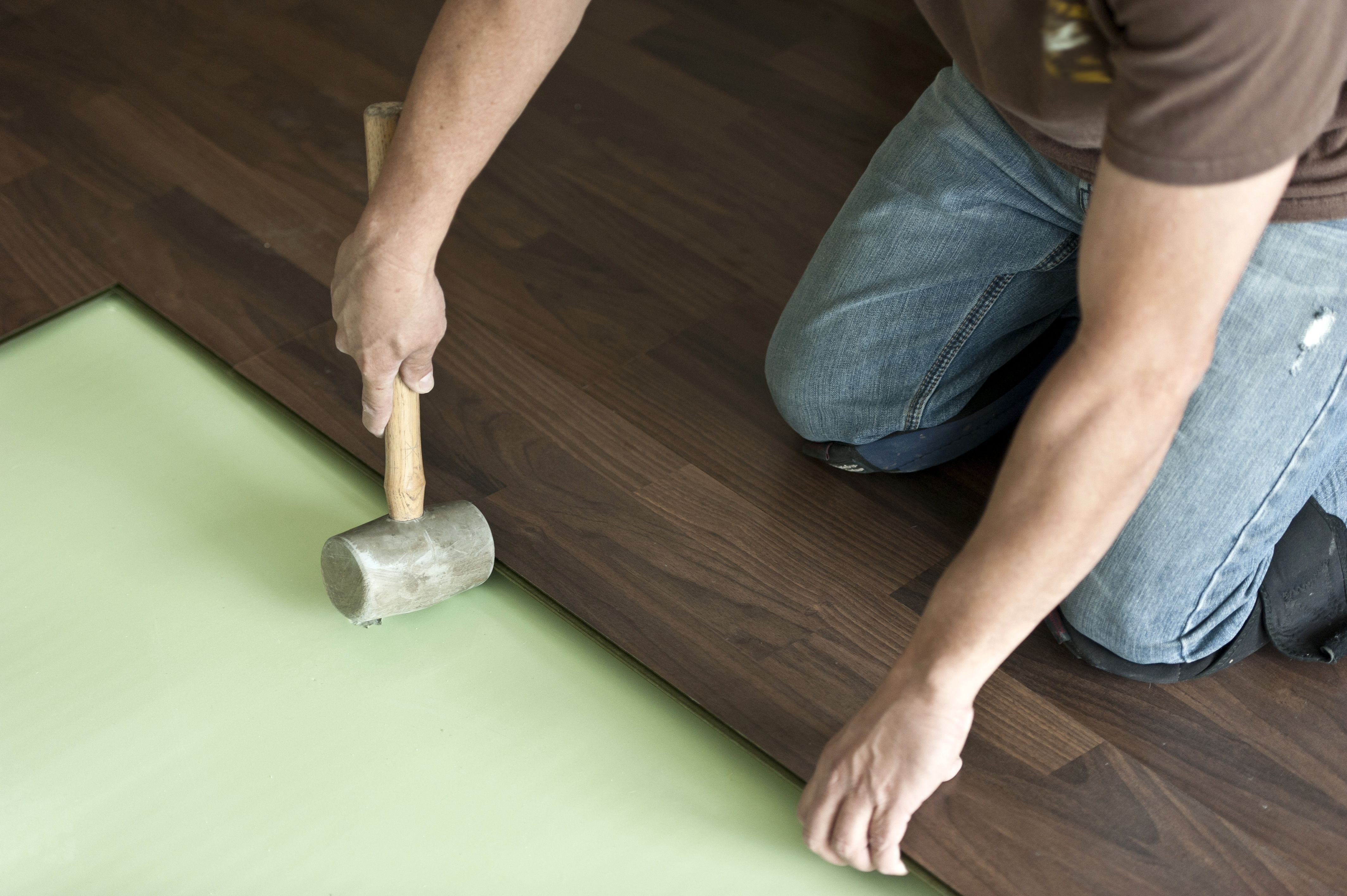 fake hardwood floor over carpet of can a foam pad be use under solid hardwood flooring for installing hardwood floor 155149312 57e967d45f9b586c35ade84a