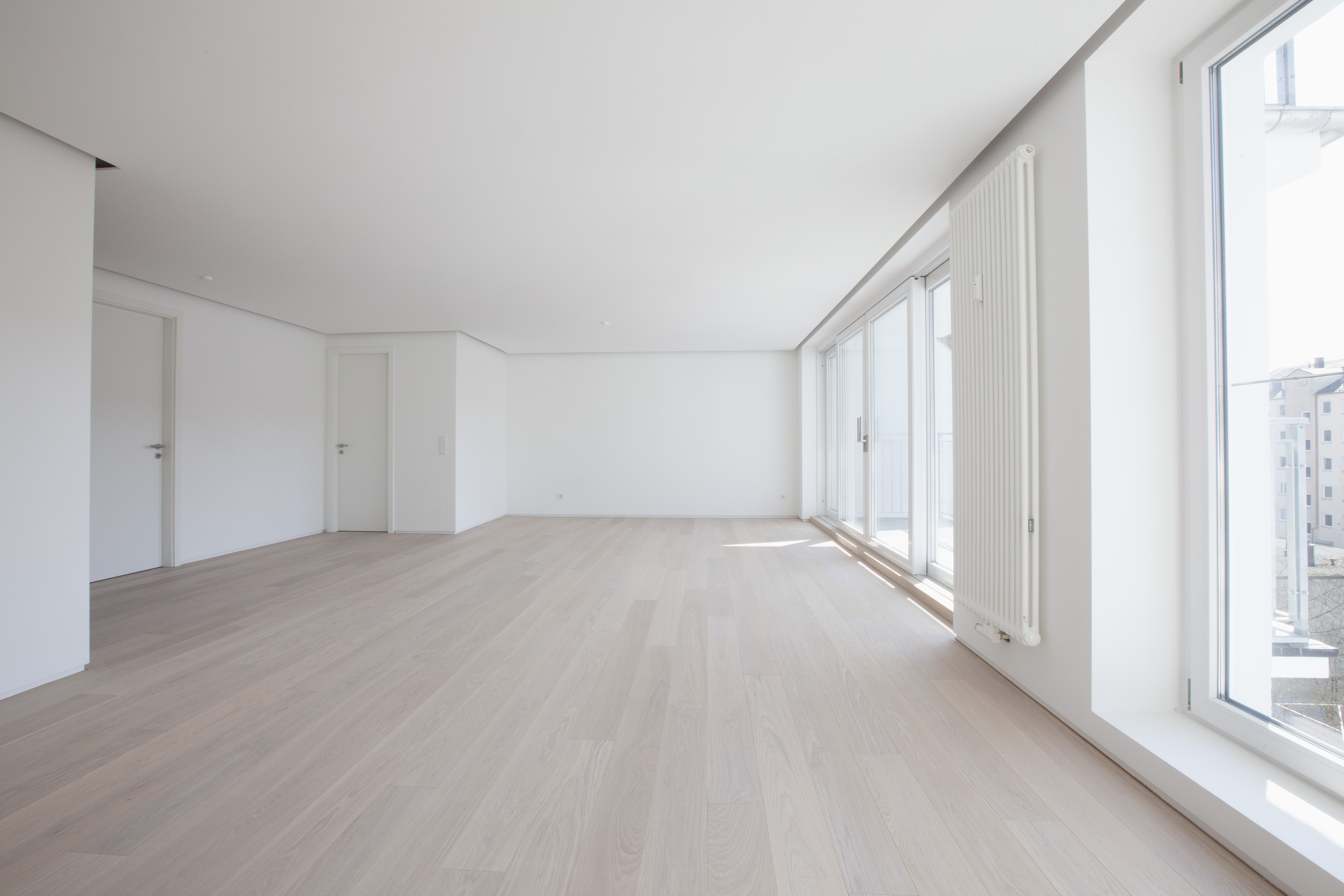 glue down solid hardwood floor of basics of favorite hybrid engineered wood floors inside empty living room in modern apartment 578189139 58866f903df78c2ccdecab05