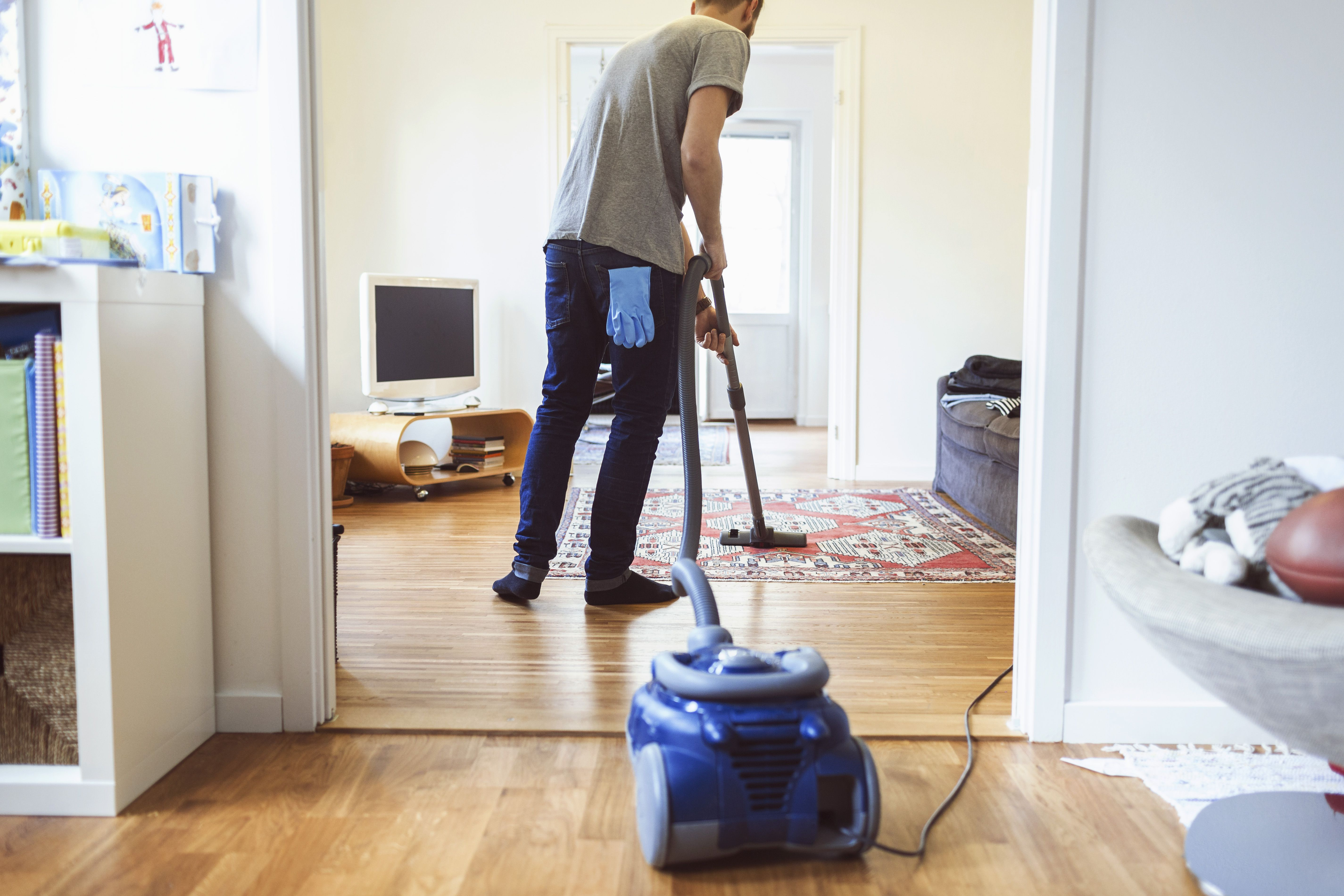 10 Recommended Good Vacuum for Pet Hair and Hardwood Floors 2024 free download good vacuum for pet hair and hardwood floors of 9 useful tips for eliminating house mites for rear view of man vacuuming carpet 562452131 5b04618b04d1cf003aa8304a