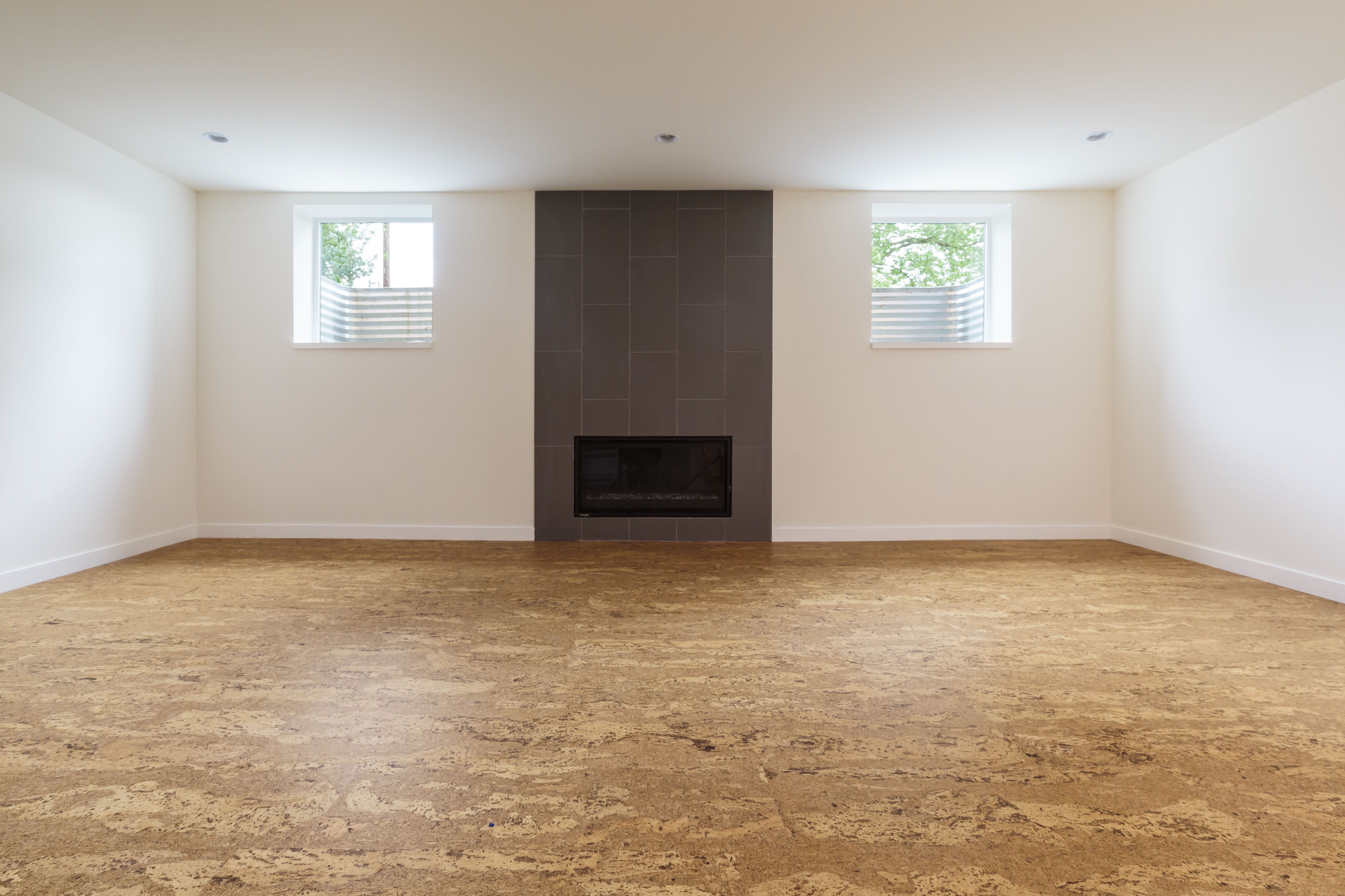 Hardwood Floor Installation Price Estimate Of Cork Flooring Pros Cons and Cost with Cork Flooring In Unfurnished New Home 647206431 57e7c0c95f9b586c3504ca07