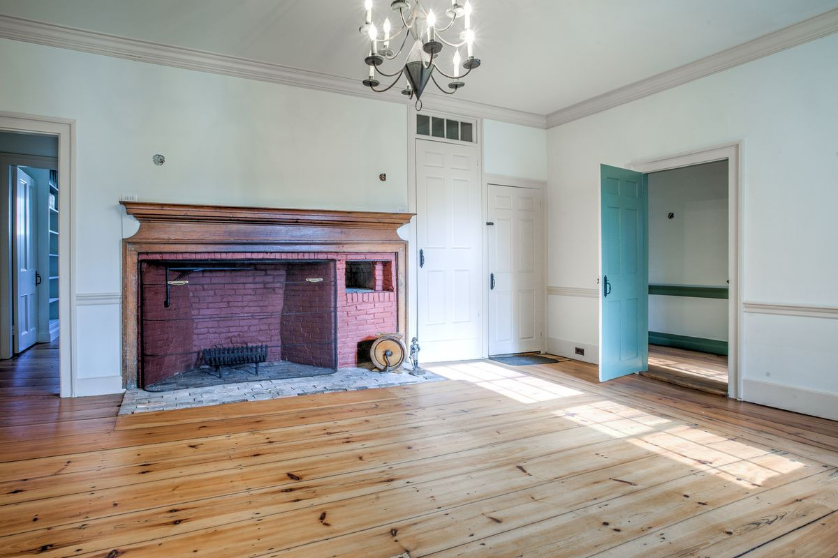 hardwood floor refinishing detroit mi of why are floorboards in older houses so wide curbed for a house in francestown new hampshire with refinished wide plank floors side note how fabulous is that fireplace courtesy of bean group amherst