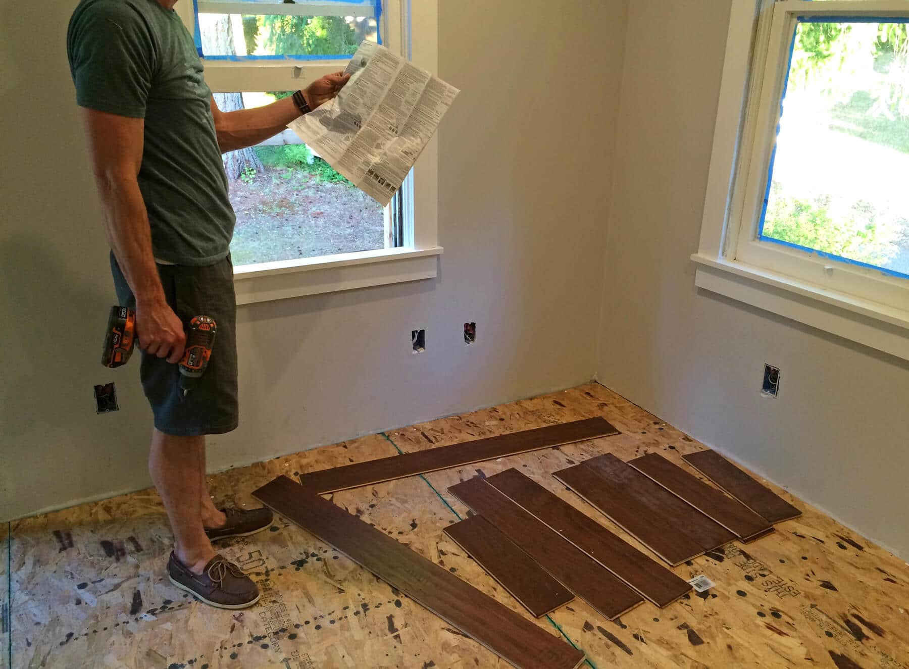 hardwood floor transition to exterior door of the micro dwelling project part 5 flooring the daring gourmet intended for the first step was to install the first row of flooring along the longest wall its crucial to get the first row even and straight because the rest of the