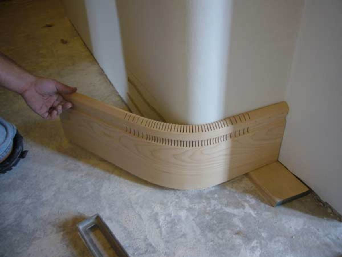 hardwood floor trim installation of cutting kerfs learn to curve boards restoration design for the inside at installation boards are spread with glue pinned into place using a pneumatic nail