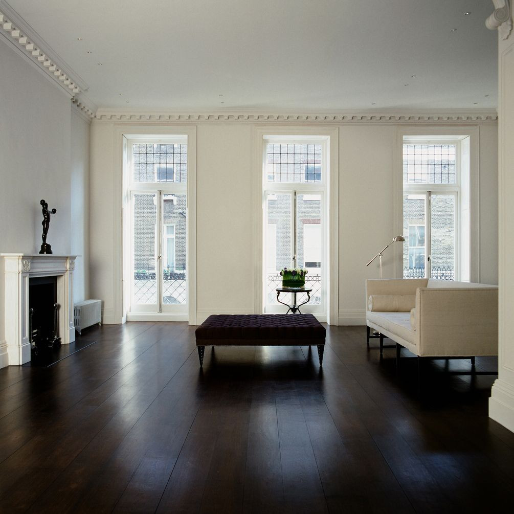 hardwood floor trim pieces of j o h n m i n s h a w d e s i g n s favorite places spaces inside minimalist with dark floors white walls and insane floor to ceiling french doors