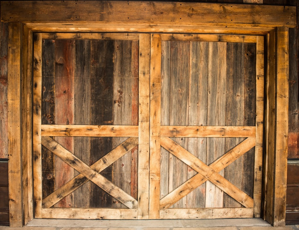 hardwood flooring outlet ontario of reclaimed wood species distinguished boards beams with regard to weathered grey pine and mixed oak barn wood siding garage door in a traditional barn style