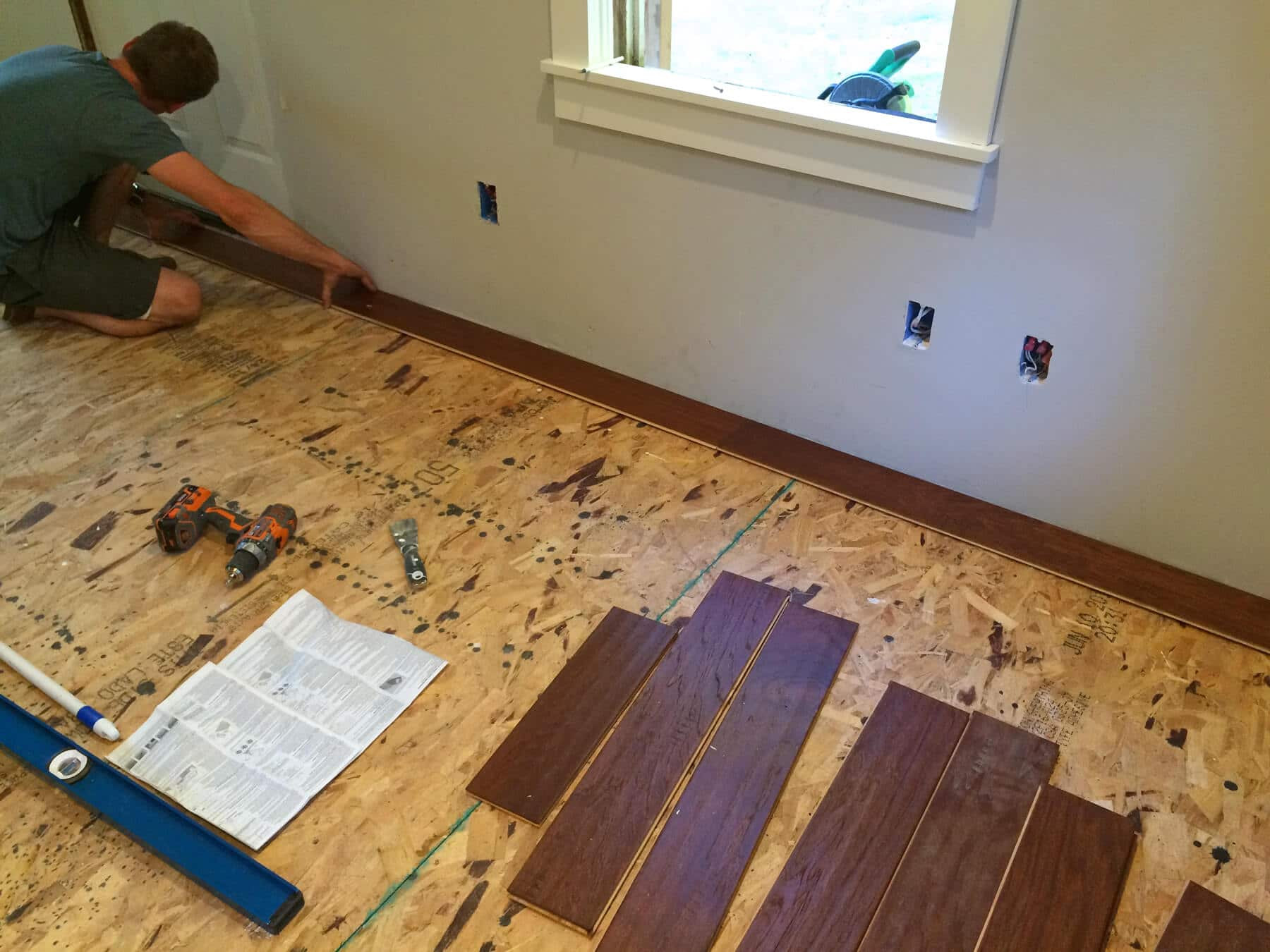 installing engineered hardwood flooring nail down of the micro dwelling project part 5 flooring the daring gourmet pertaining to the nails in the first row have to be face nailed down as close to the wall as possible so that the baseboards will cover the nails