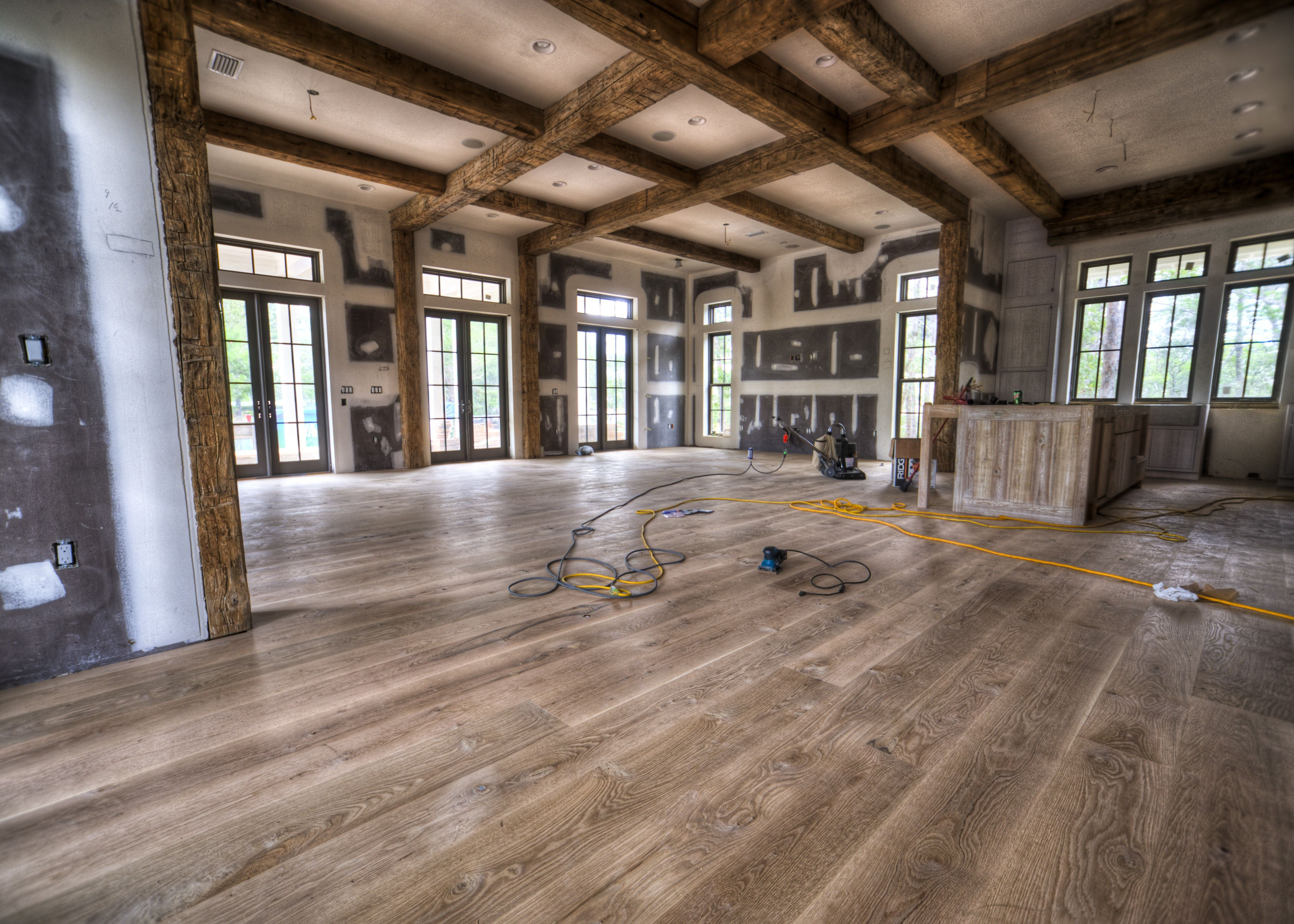 quality hardwood floor installation of reclaimed hand hewn beams and reclaimed flooring restoration of inside barnstormerswood offers quality reclaimed wood flooring in a variety of designs from circle sawn to hand scraped flooring our selection will not leave you