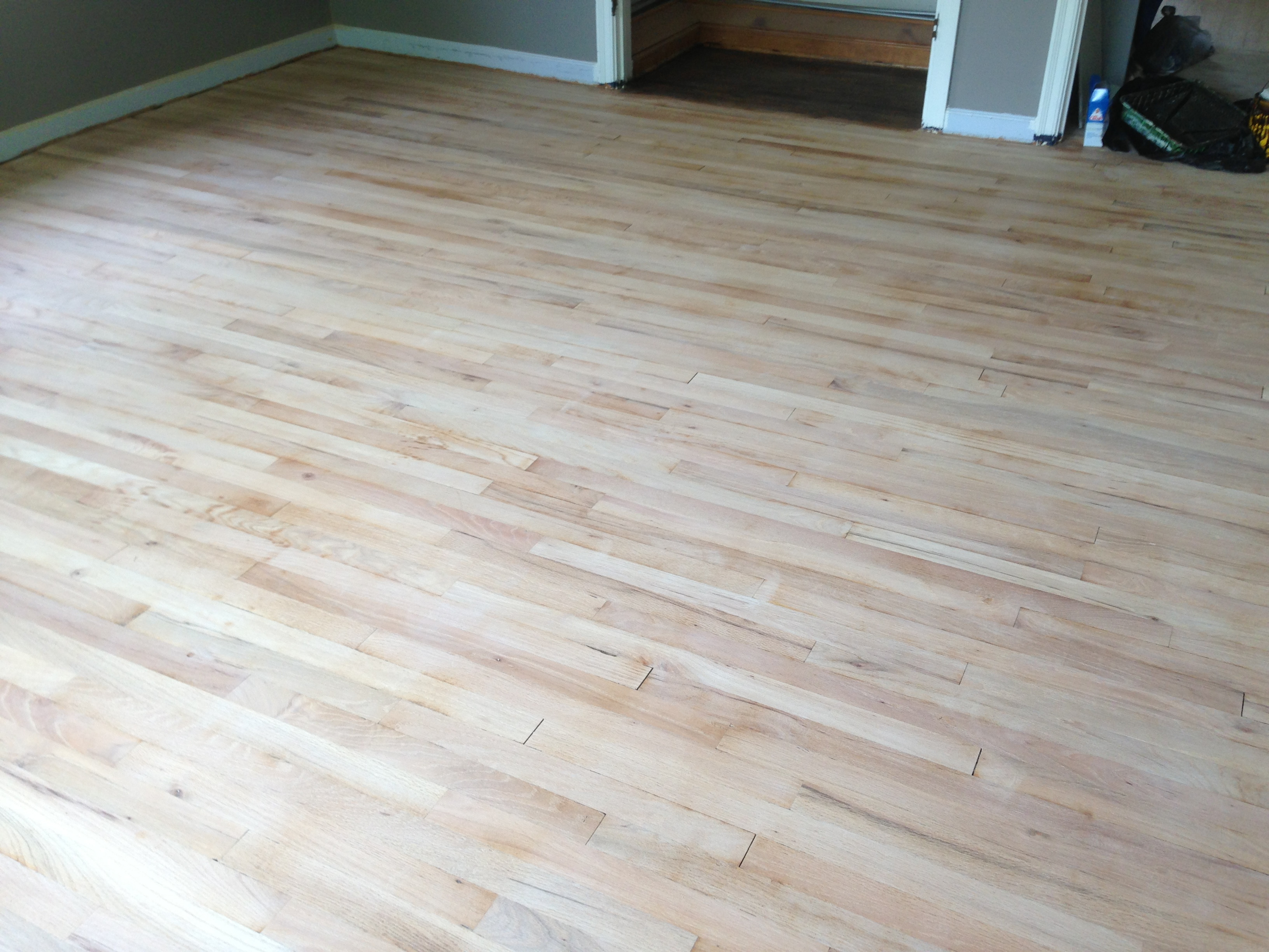 refinishing hardwood floors under carpet of hardwood floors flair within after tediously sanding the floors we were ready for the next step of staining and sealing the floors here is a picture of the floors pre staining