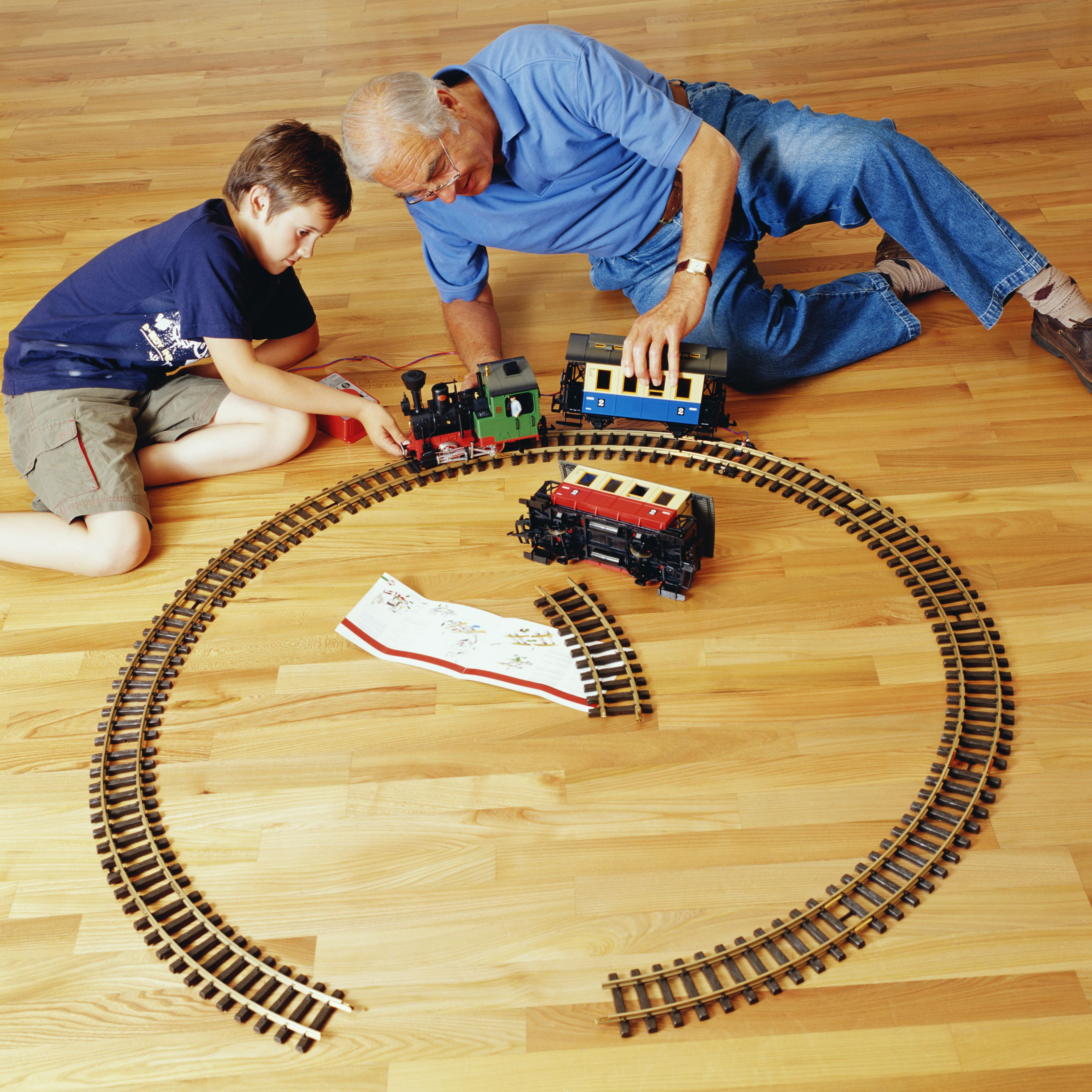 16 Spectacular Reversing Hardwood Flooring Direction 2024 free download reversing hardwood flooring direction of model train track curves and how to use them pertaining to grandson and grandfather playing with railway