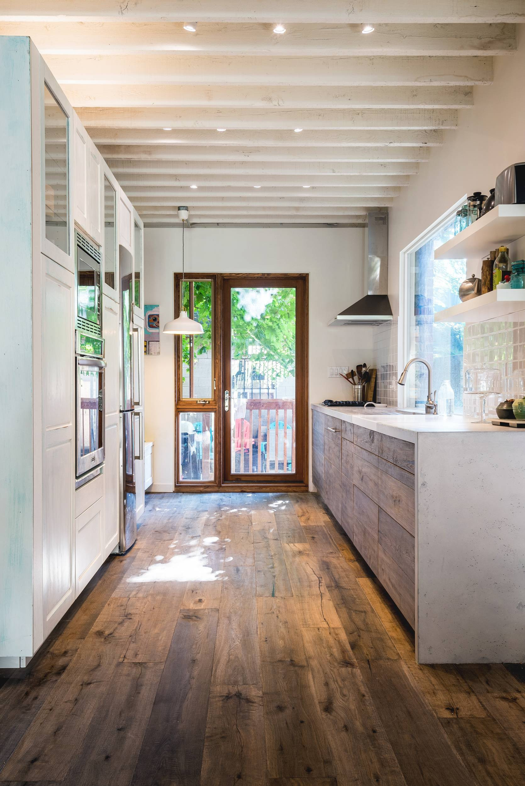 used hardwood flooring for sale in toronto of in forgotten corner of toronto a storefront home regains some retro regarding the flooring in the kitchen carries onto the cabinets creating a wraparound look andrew snow
