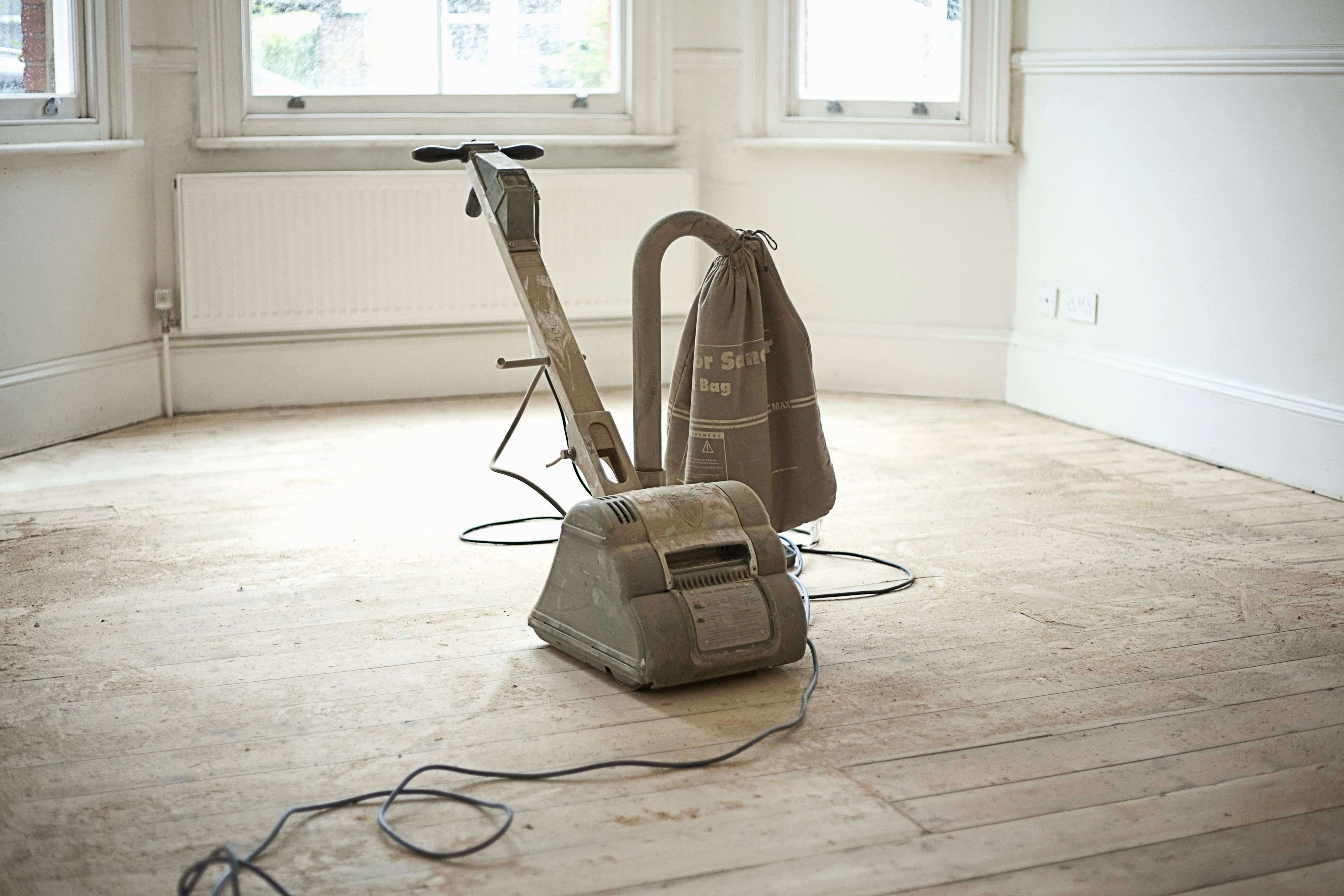 vacuum cleaner for hardwood floors reviews of floor sanders to rent when finishing your wood floor in sander on wooden floorboards of new home 179707189 588760815f9b58bdb3fed440